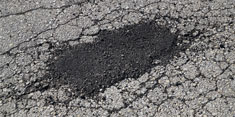 Photo of a patched pothole